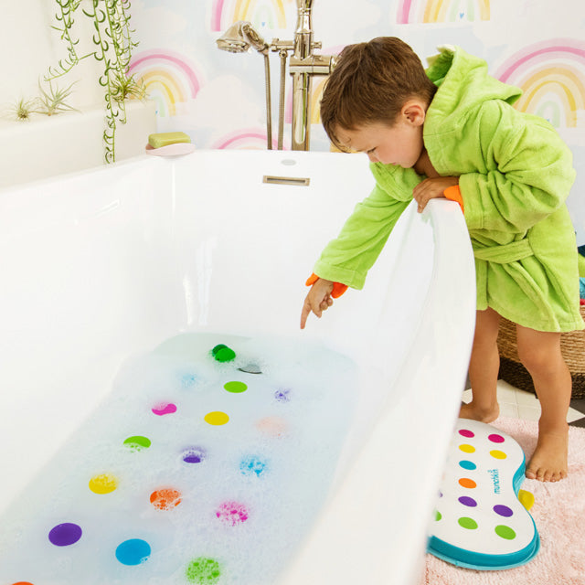 Munchkin- Dots™ Bath Mat
36 Months + - Multi Color